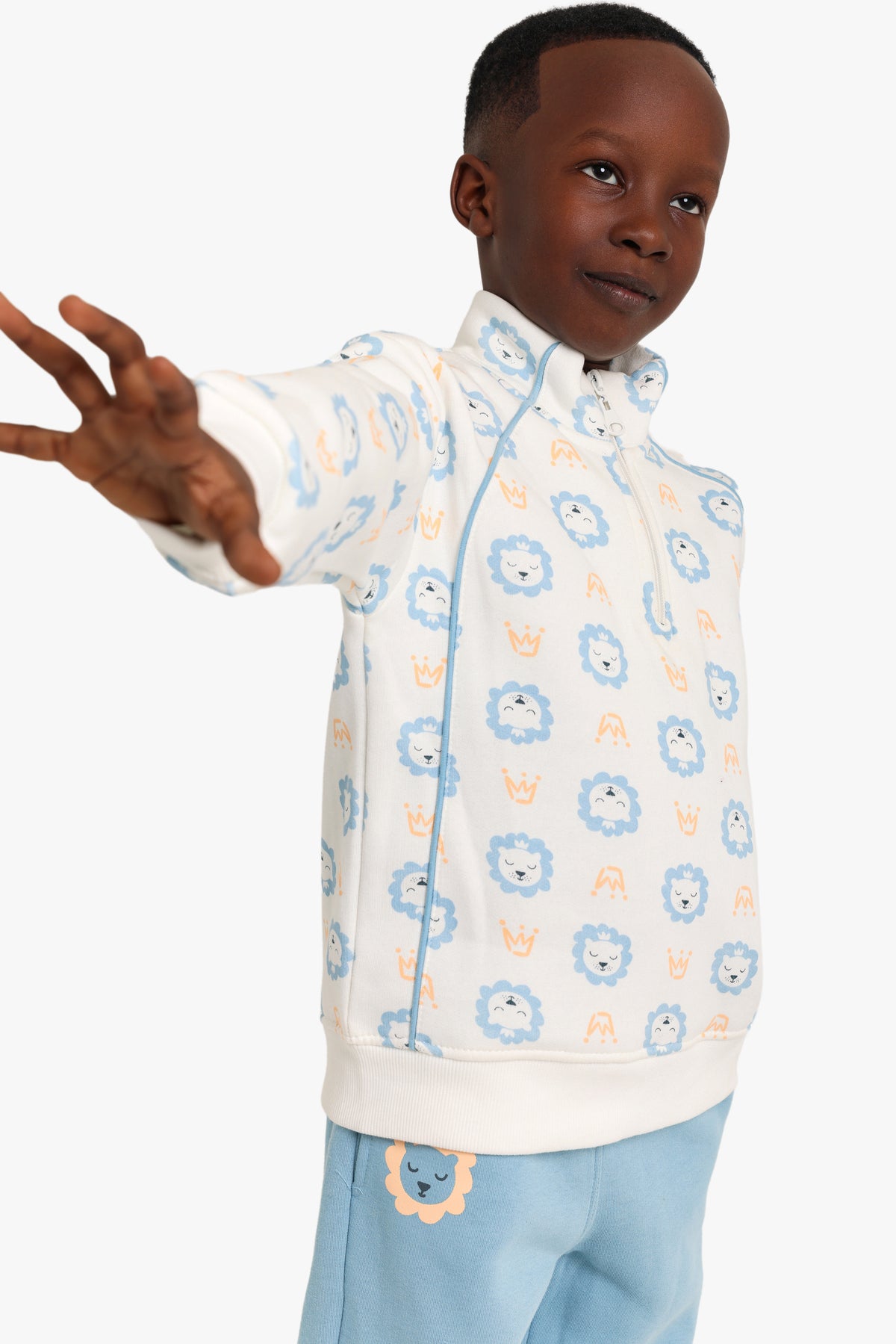 Junior Boys Half-Zip Pyjama Set - Lion Print Cream & Blue